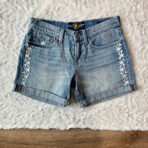 Lucky Brand Women's Blue Denim Shorts with White Floral Stitching Size 00 / 24